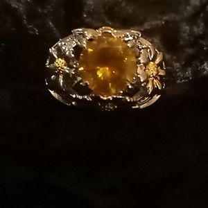 Elegant Gold and Silver Ring with Yellow Gemstone